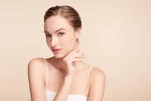 Woman with fresh, youthful skin from PDO threads or dermal fillers in East Greenwich